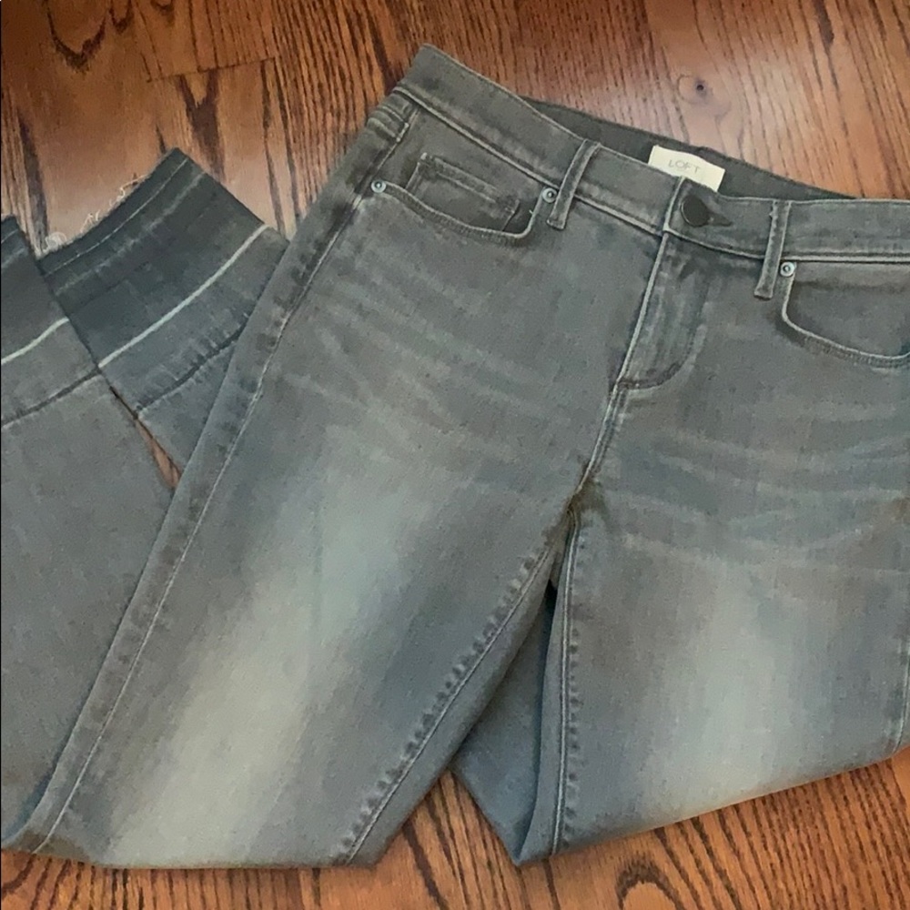 Grey distressed skinny jeans